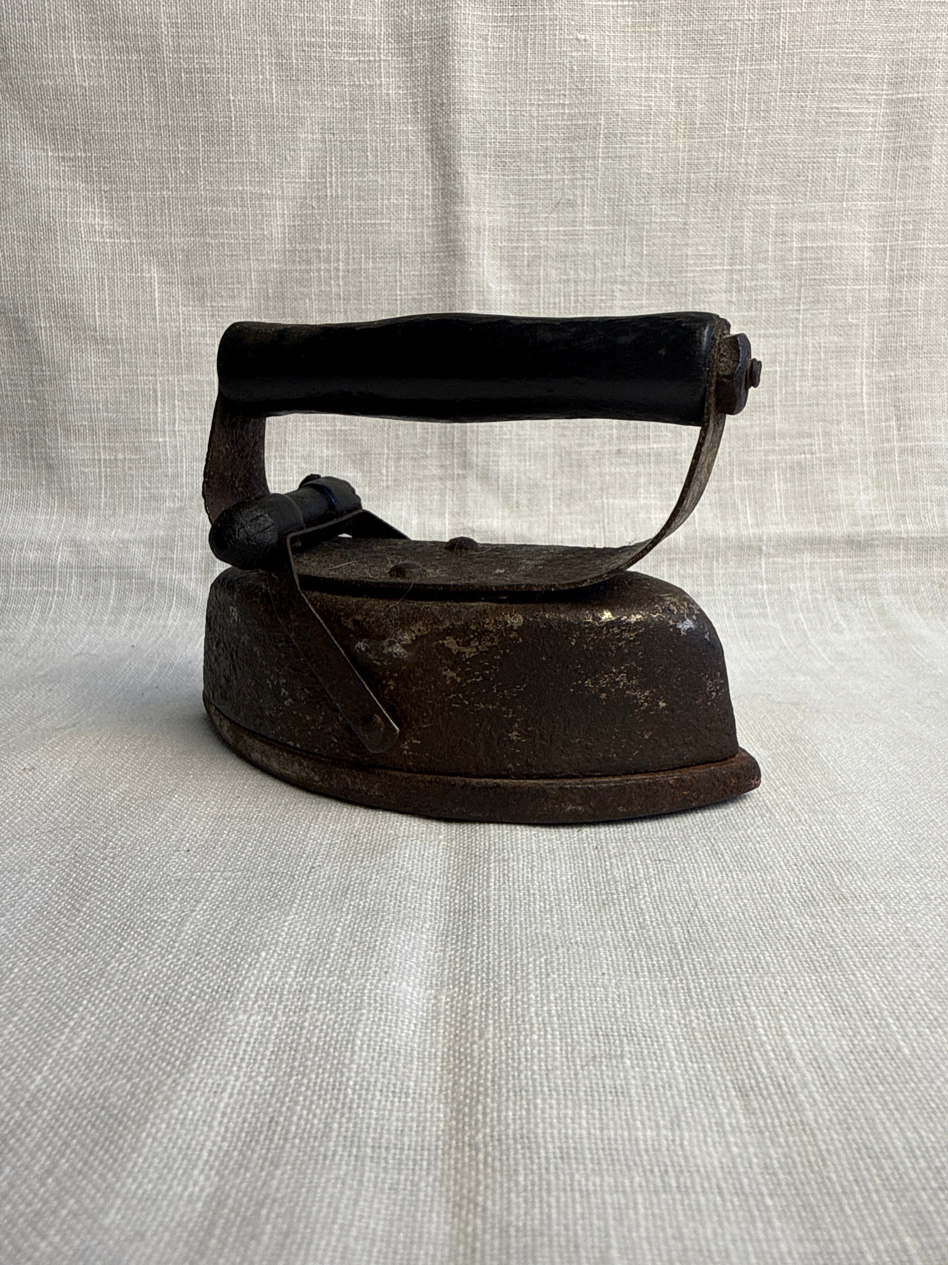 Small Decorative Child’s Sad Iron 9