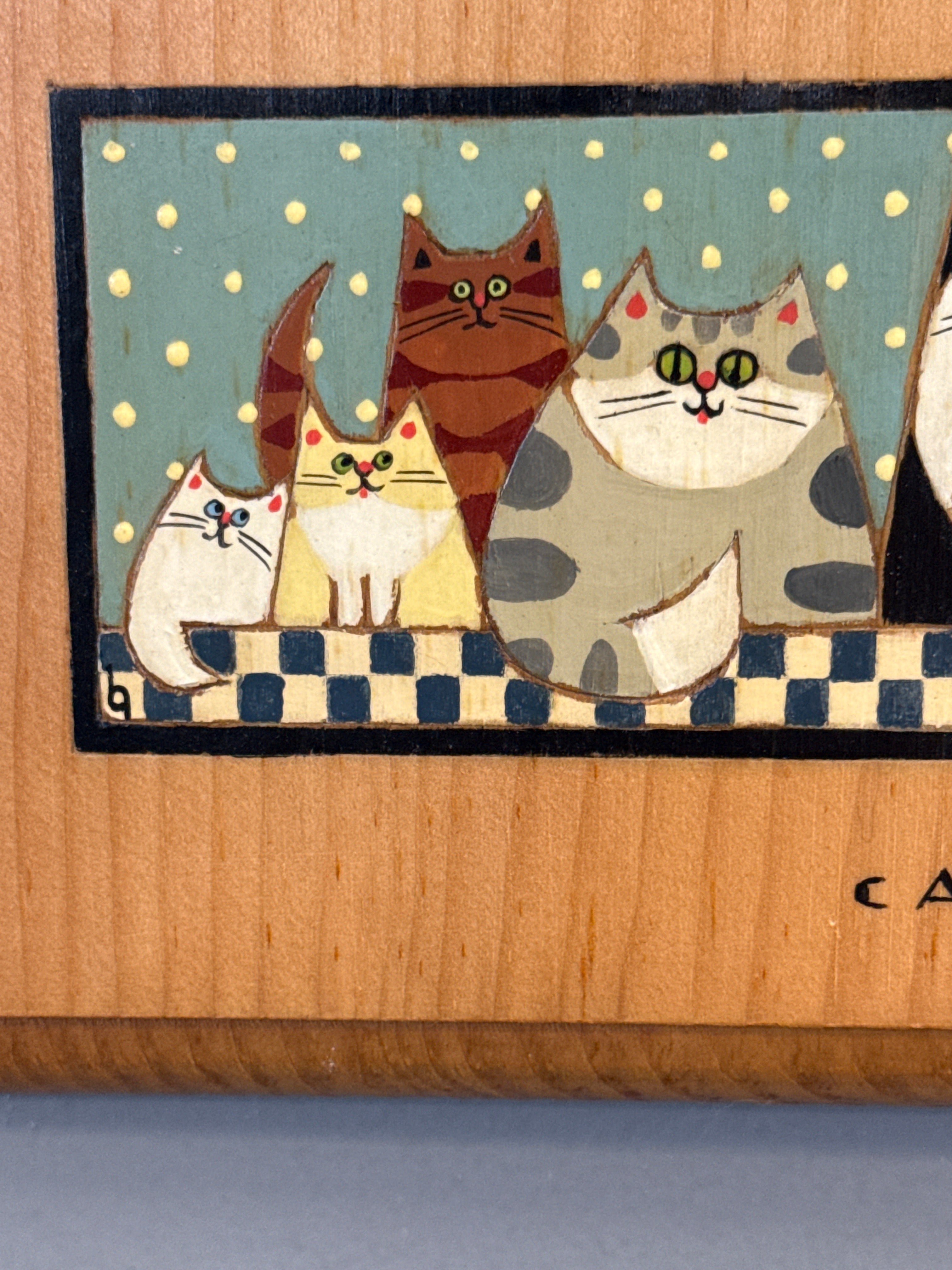 One can never have too many cats on hand decor art