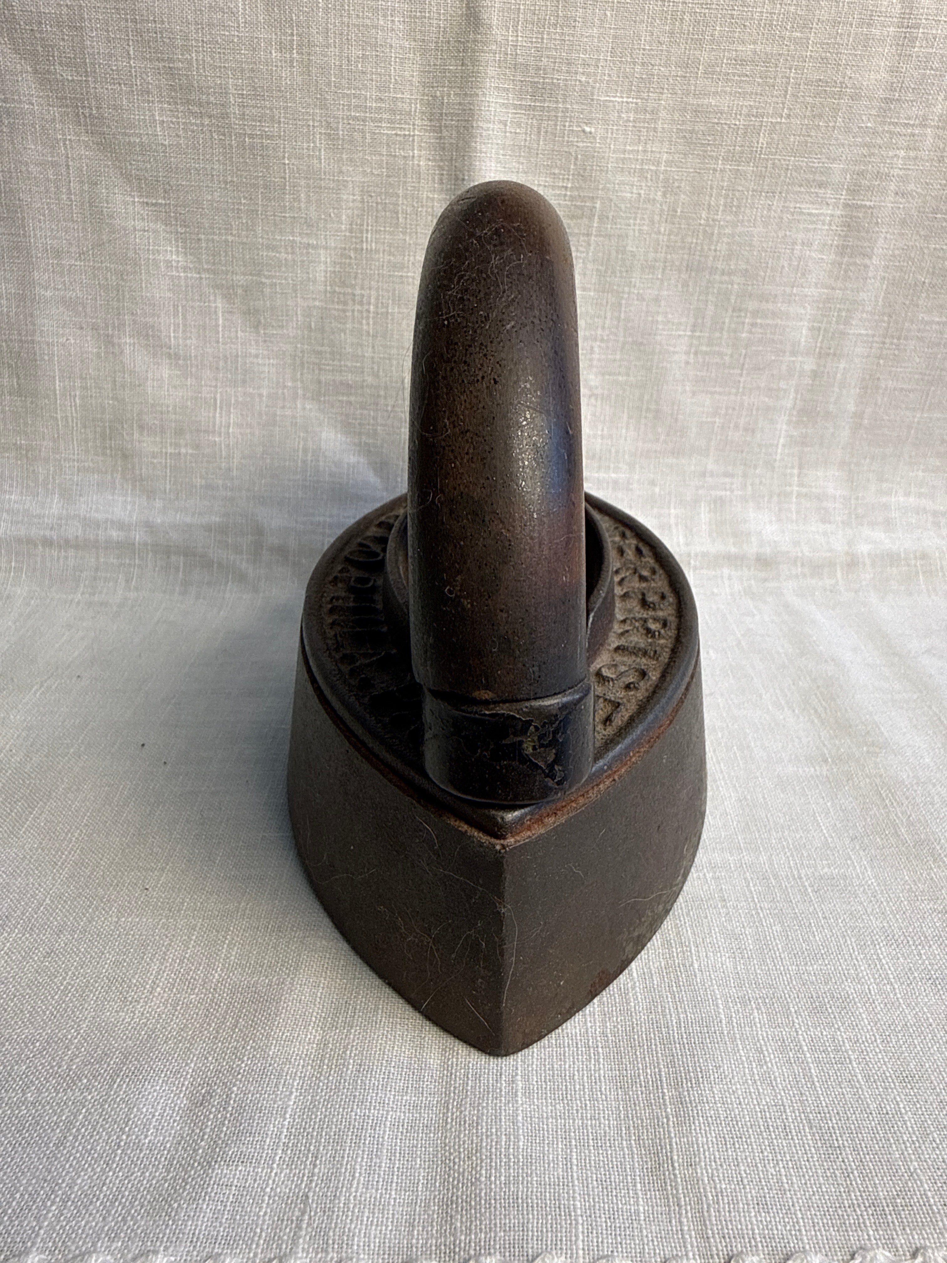 Two piece wooden Handle Sad Iron 7”